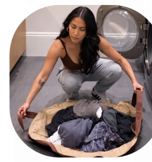The convertible bag opened flat in use: laundry